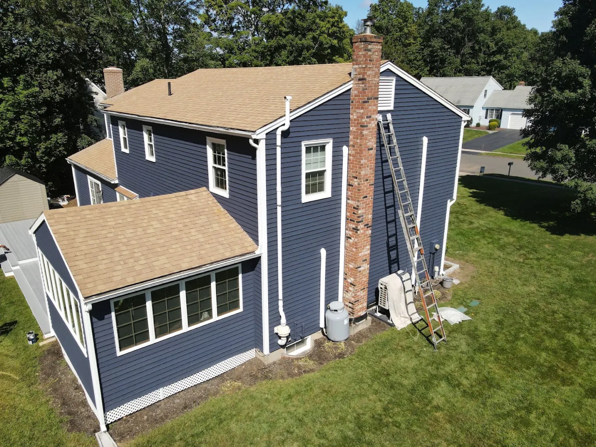 Exterior painting - white colonial with columns and garden CT