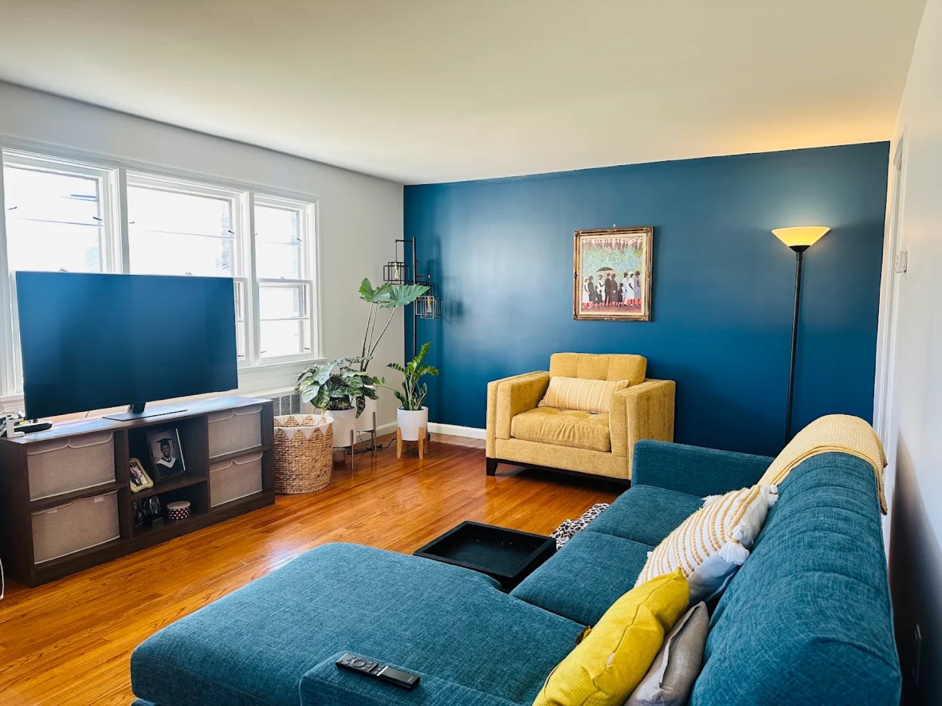Interior accent wall painting - bold blue living room in Connecticut