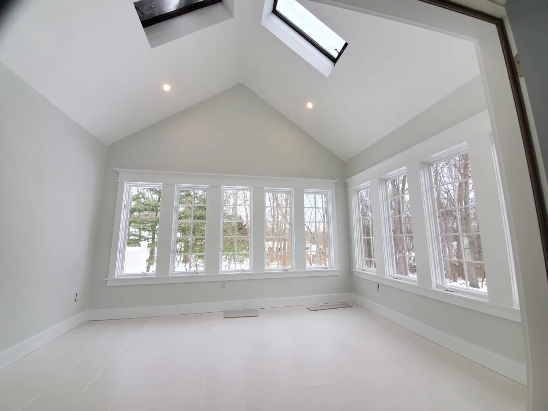 Interior painting - sunroom with skylights and vaulted ceiling CT
